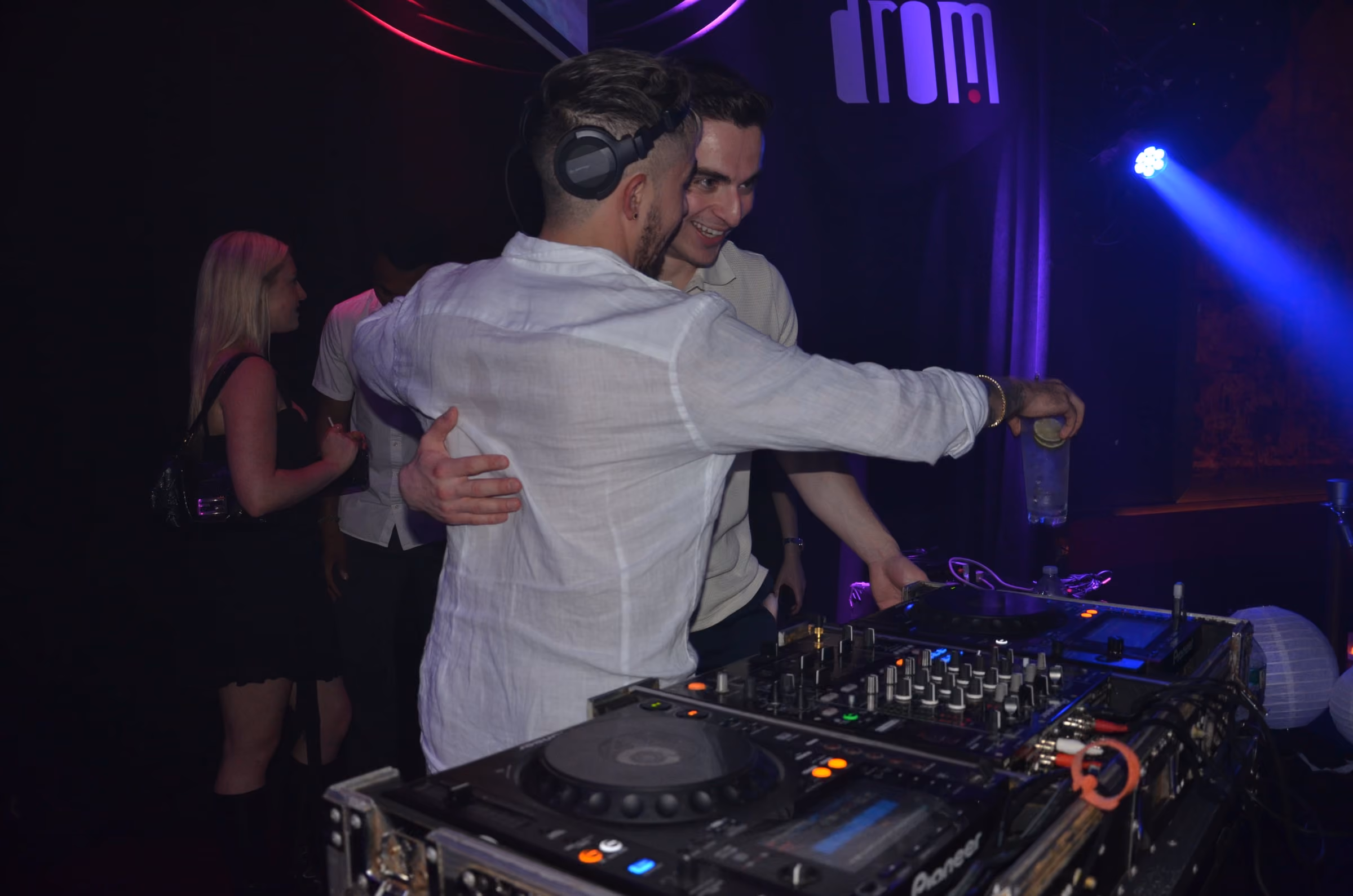 A hug behind the decks at Drom